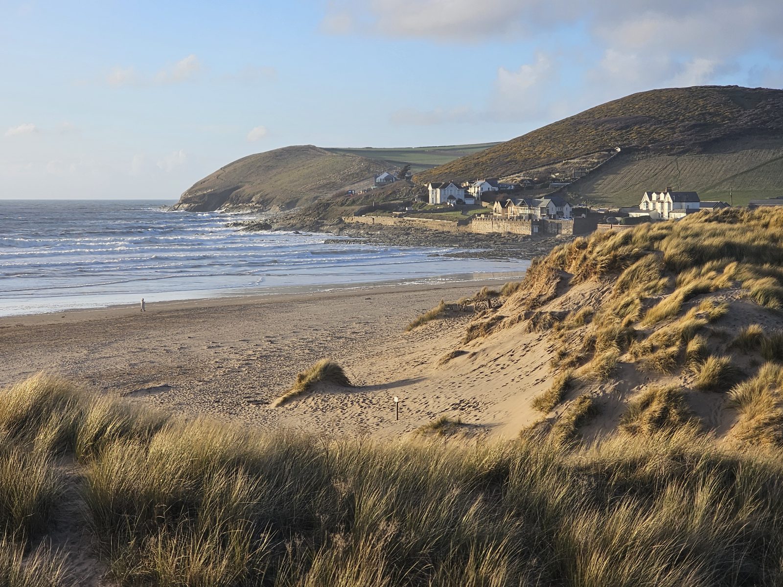 Croyde Bay beach with dunes and the headland beyond