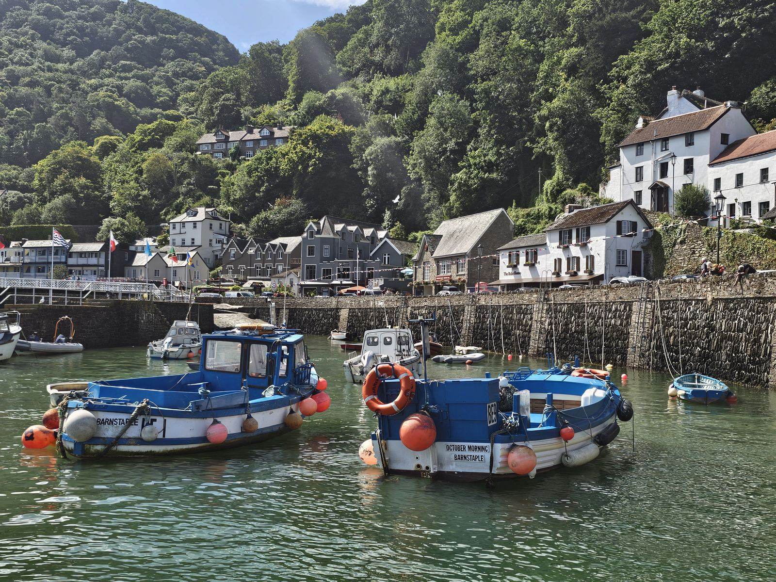 Lynmouth harbour with fishing boats, seen from across the water